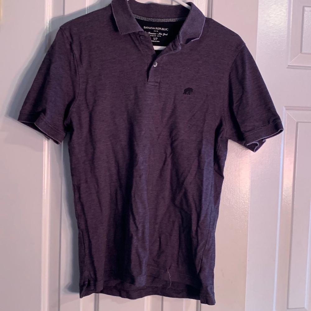 Men's small, used Banana Republic polo. Purple with two buttons and light wear.